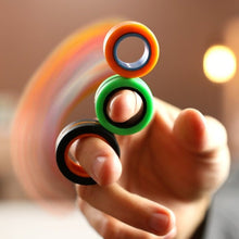 Load image into Gallery viewer, Fingears Magnetische Ringen Oranje Zwart trucje
