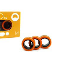 Load image into Gallery viewer, Fingears Magnetische Ringen Oranje Zwart bovenaanzicht
